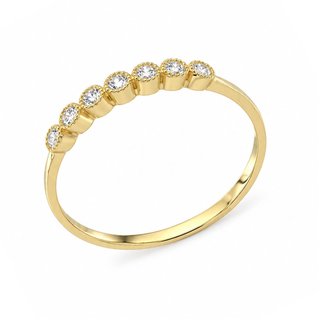 Anillo Fino de Oro 18K con Siete Circonitas