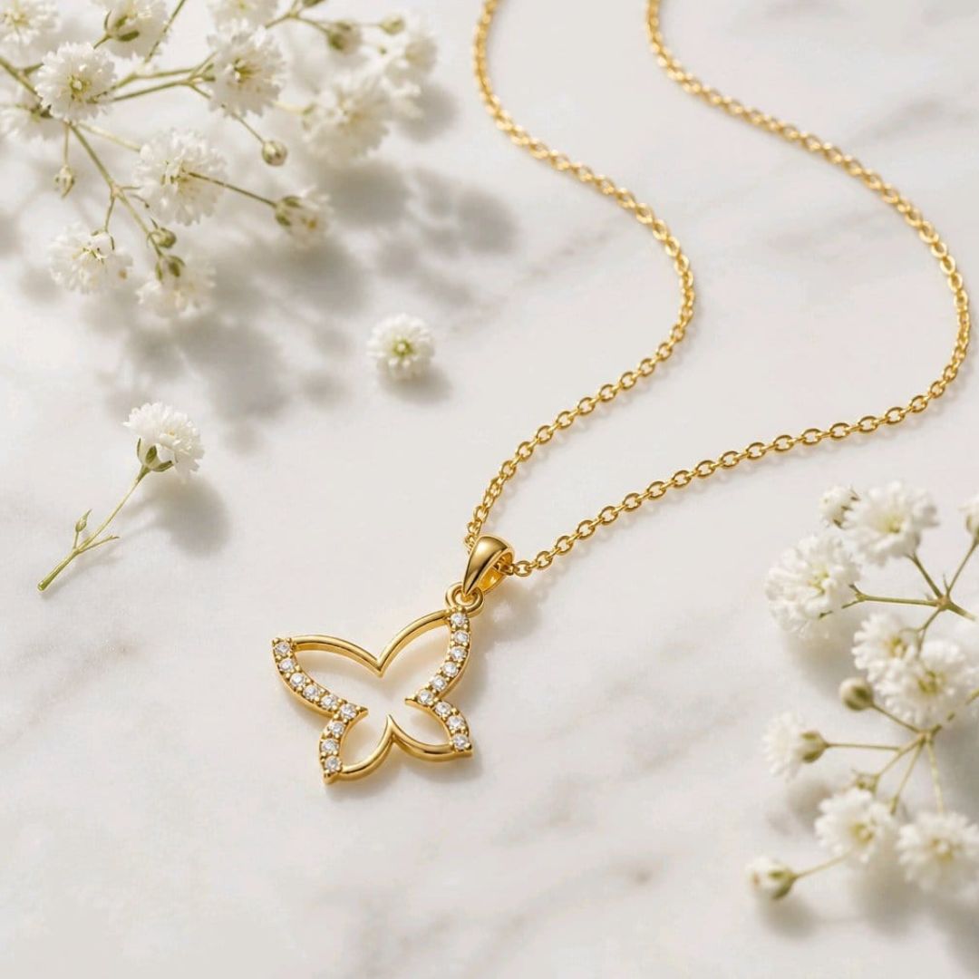 Colgante Mariposa de Oro 18K con Circonitas
