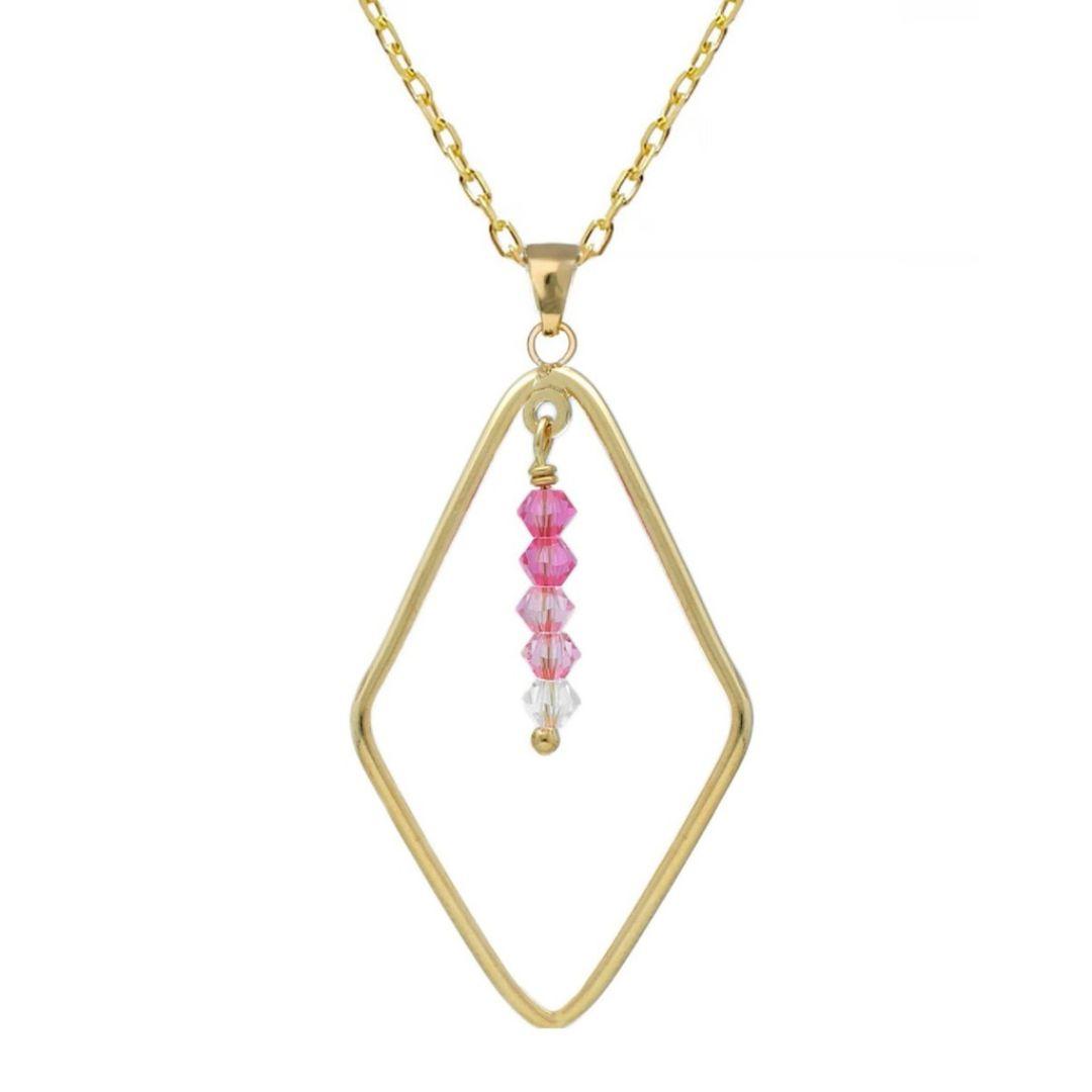 Collar Anya Rombo con Cristales Fucsia en Plata de Ley bañada en Oro · Victoria Cruz