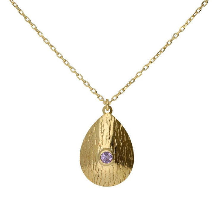 Collar gota con cristal violeta en Plata baño Oro · Victoria Cruz