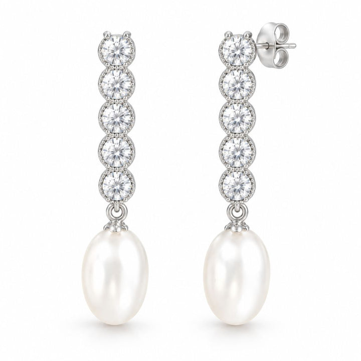 Pendientes largos de plata con piedras en línea y perla