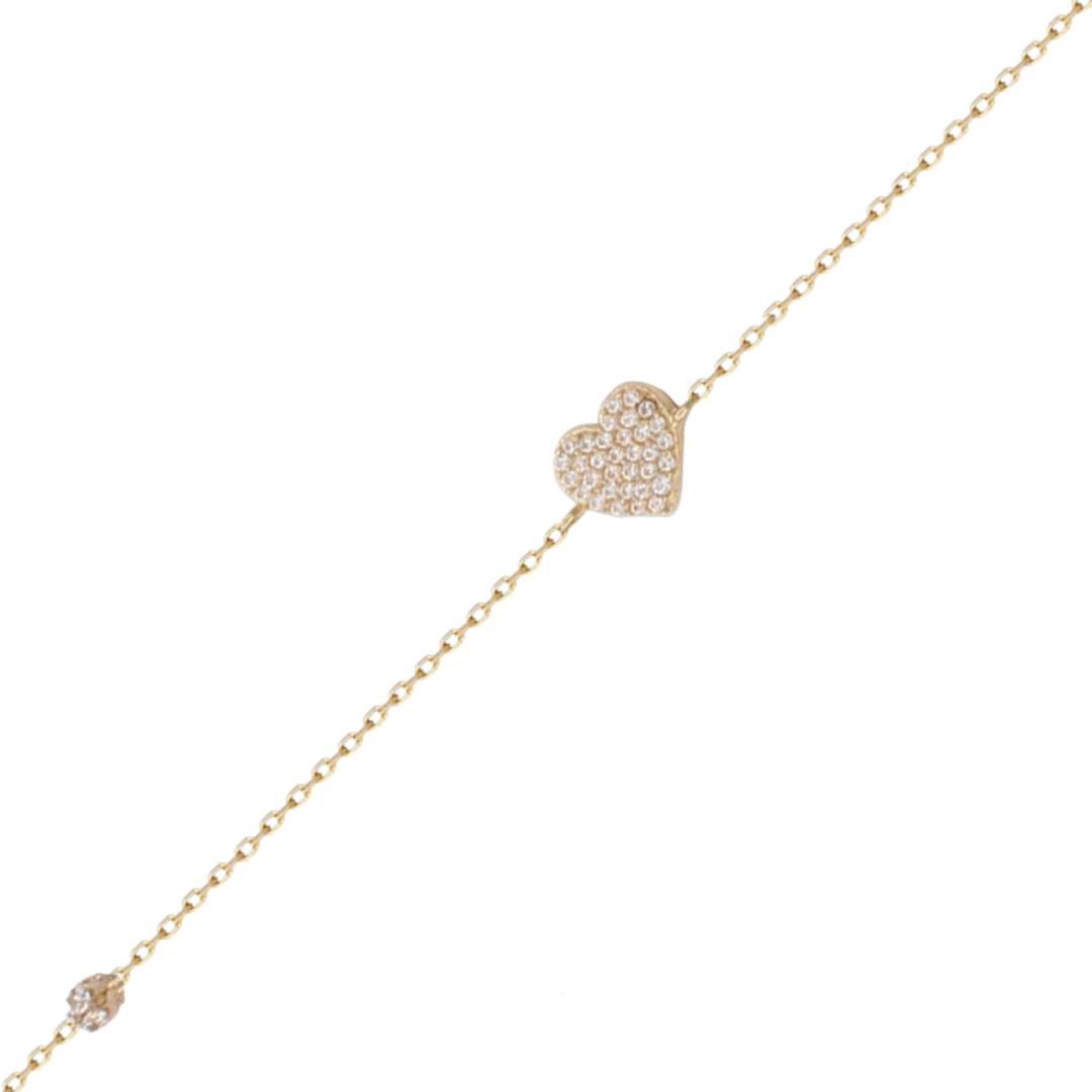 Pulsera de oro amarillo en forma corazon con circonitas
