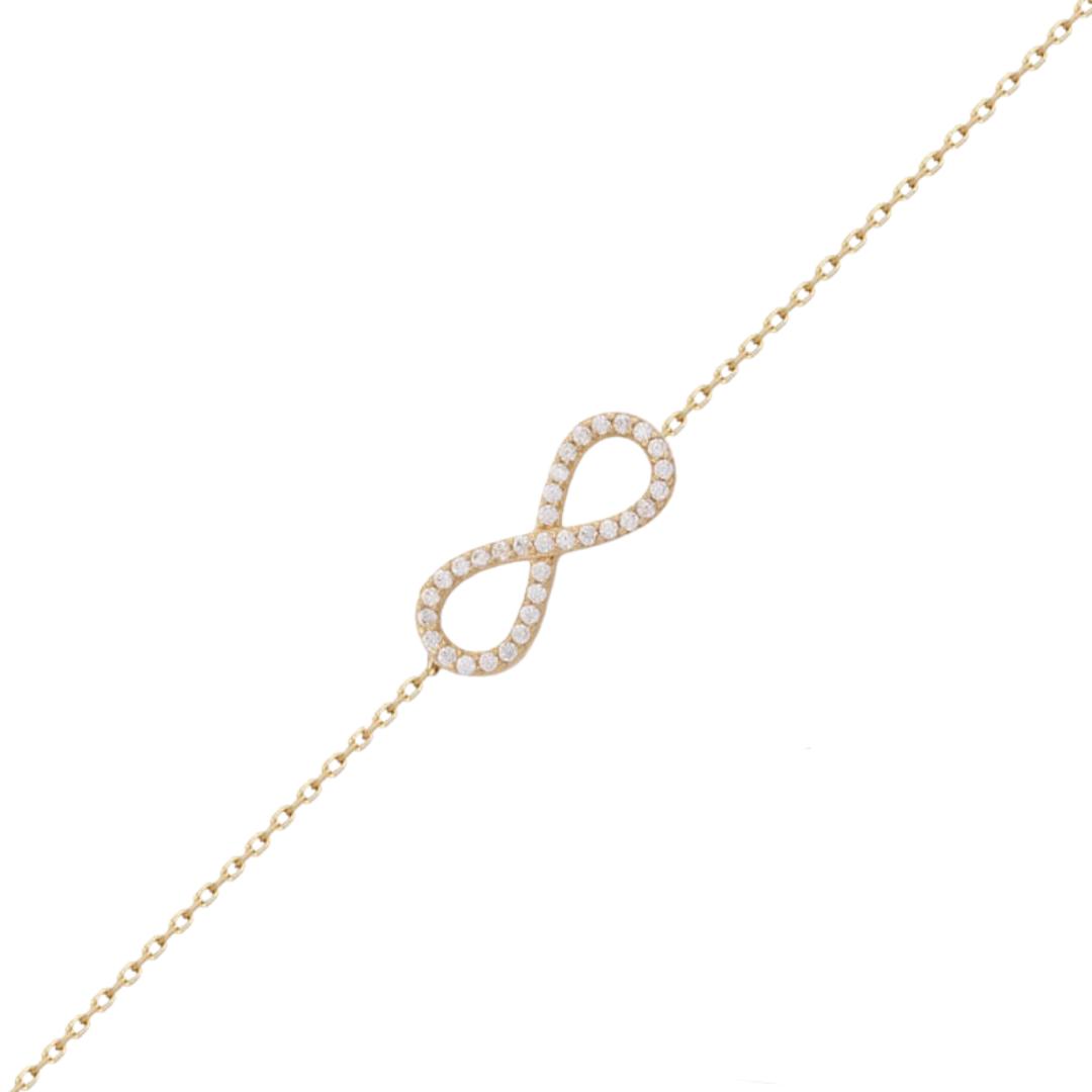 Pulsera de oro amarillo en forma infinito con circonitas