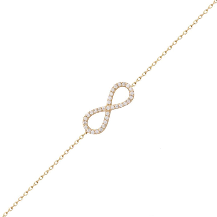 Pulsera de oro amarillo en forma infinito con circonitas