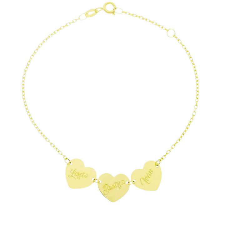 Pulsera de oro amarillo con 3 corazones personalizados