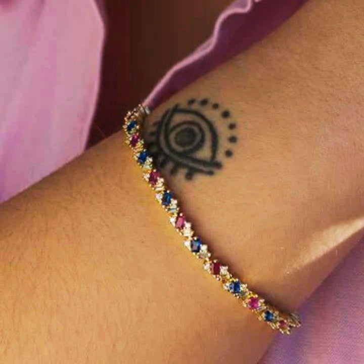 Pulsera de plata con piedras en línea con circonitas multicolor talla esmeralda y redonda cierre lengüeta