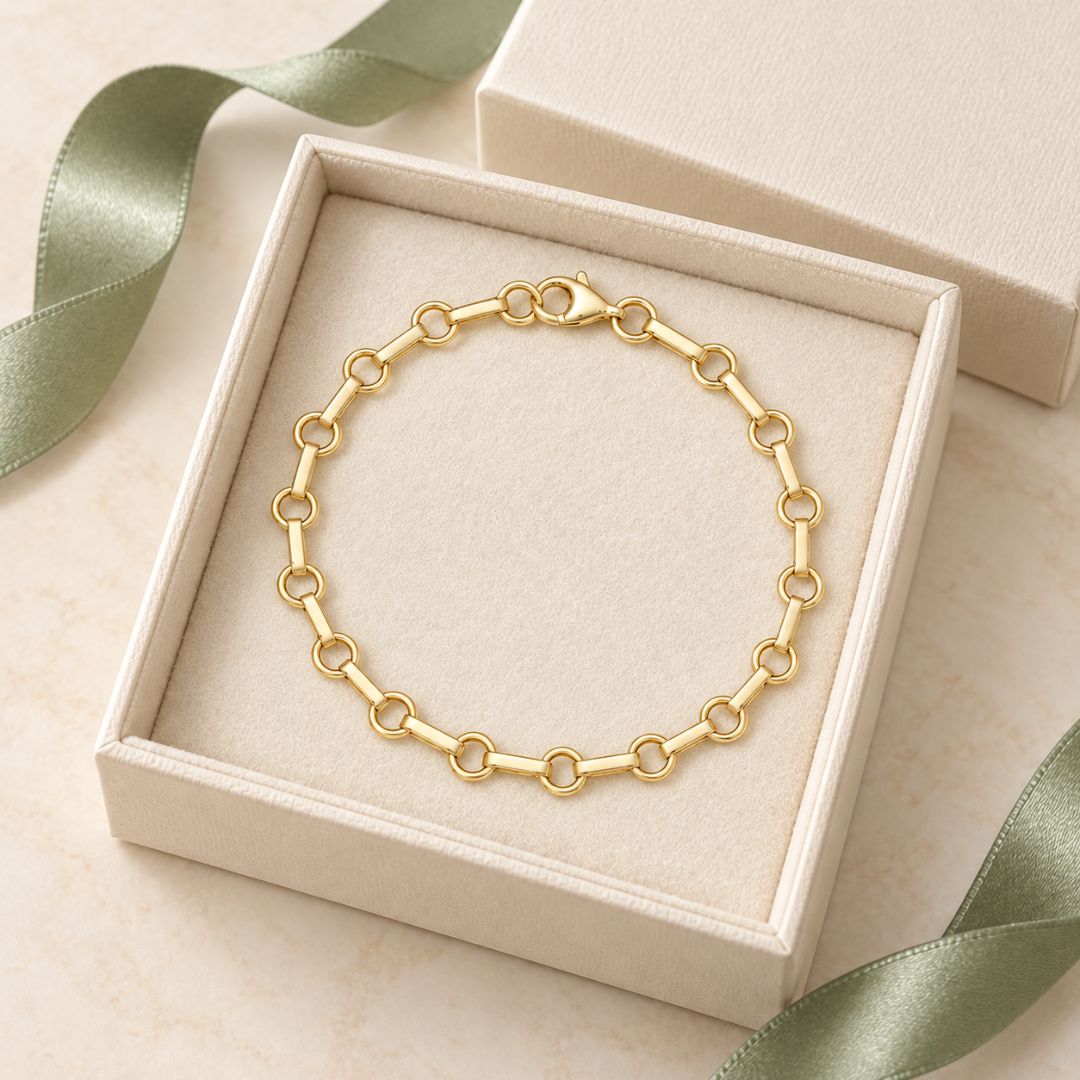 Pulsera de oro 18K con círculos y barritas · 4 mm