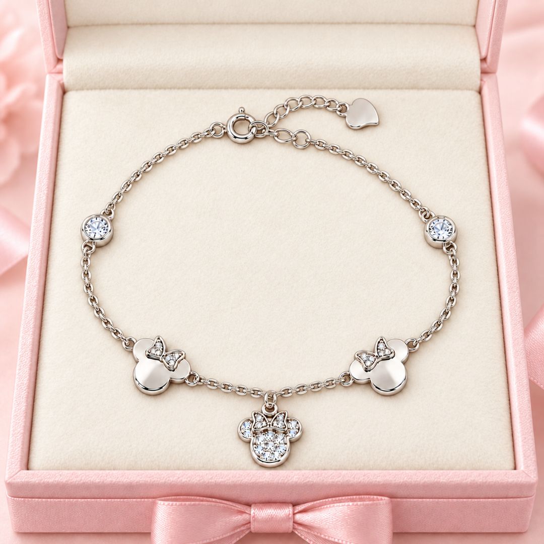 Pulsera de plata con colgantes de Minnie · Pequeñas sonrisas